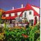 Ruths Hotel i Skagen, oliemaleri 80x80cm af Sarah Hi